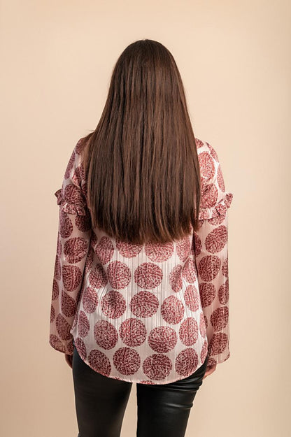 Blusa semitrasparente a fantasia