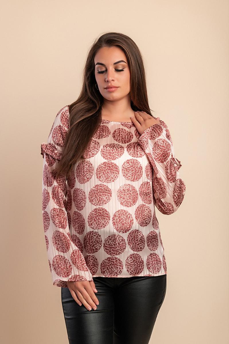 Blusa semitrasparente a fantasia