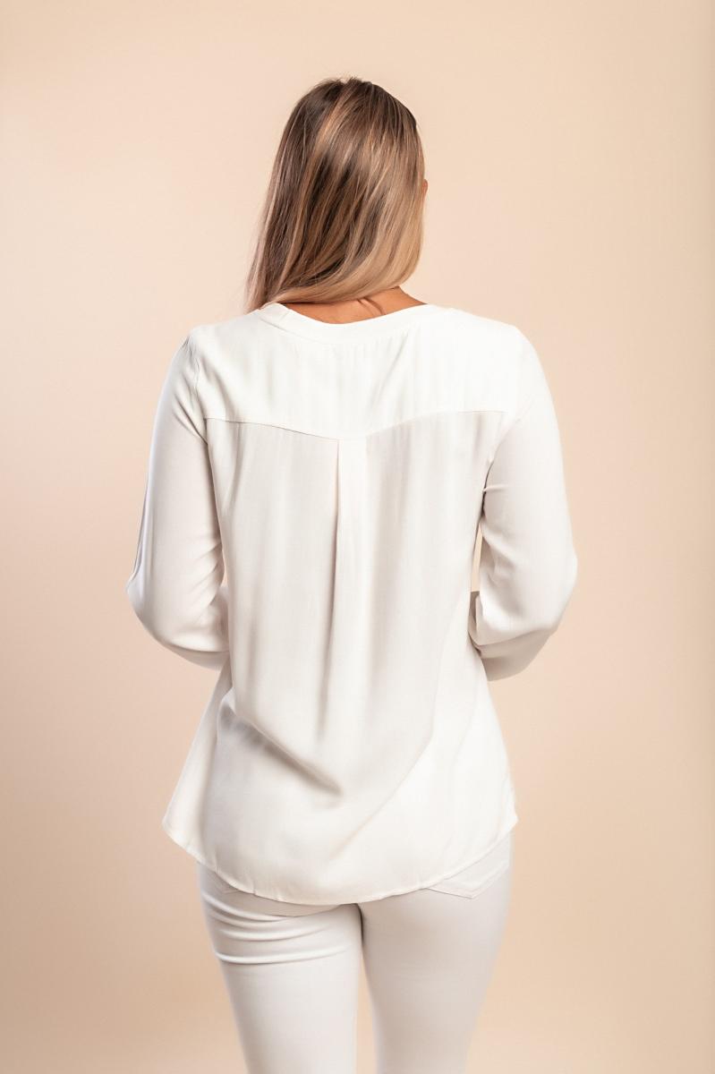 Plus size blouse with decorative pocket