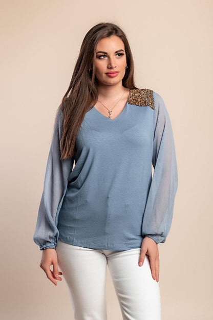 Bluza većih veličina s ukrasnim detaljem