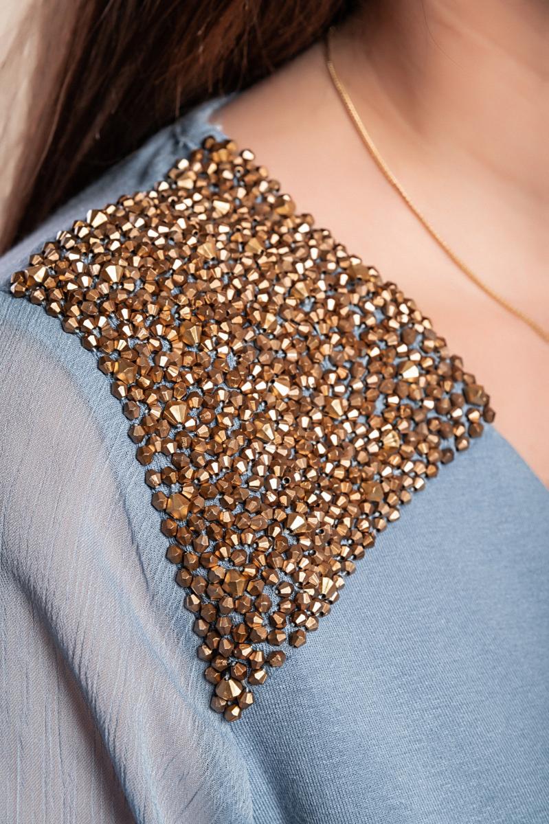 Bluza većih veličina s ukrasnim detaljem