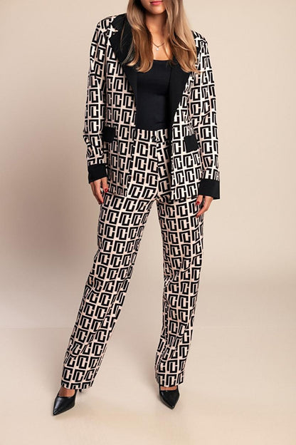 Blazer e pantaloni coordinati a stampa geometrica