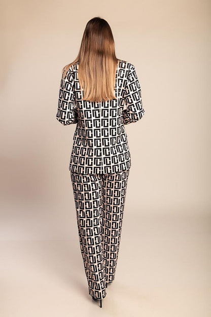 Blazer e pantaloni coordinati a stampa geometrica
