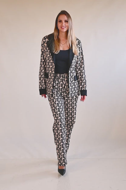 Blazer e pantaloni coordinati a stampa geometrica